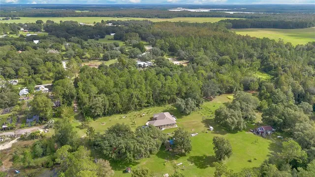 a view of a lake with a yard