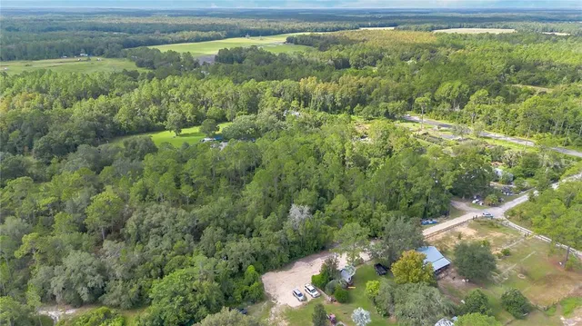 a view of a lake with a yard