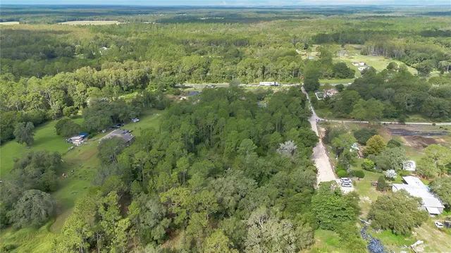 a view of a yard with an outdoor space