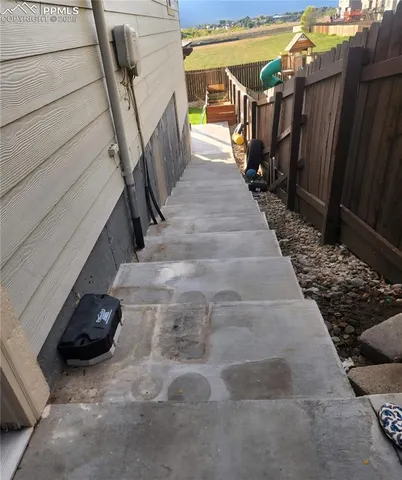 a view of balcony with furniture