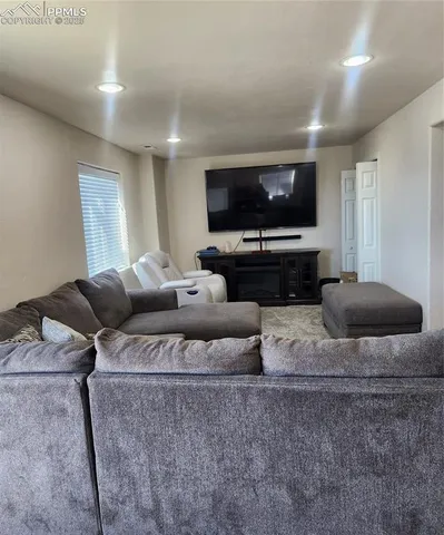 a room with mirror and window