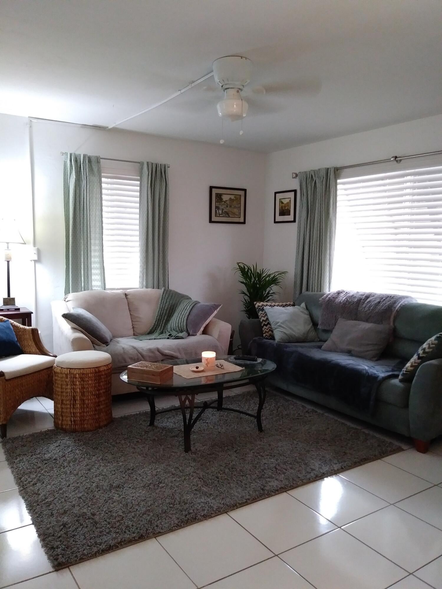 1612 Laird Street Key West, FL 33040 - Photo 13 of 18 a living room with furniture wooden floor and a window