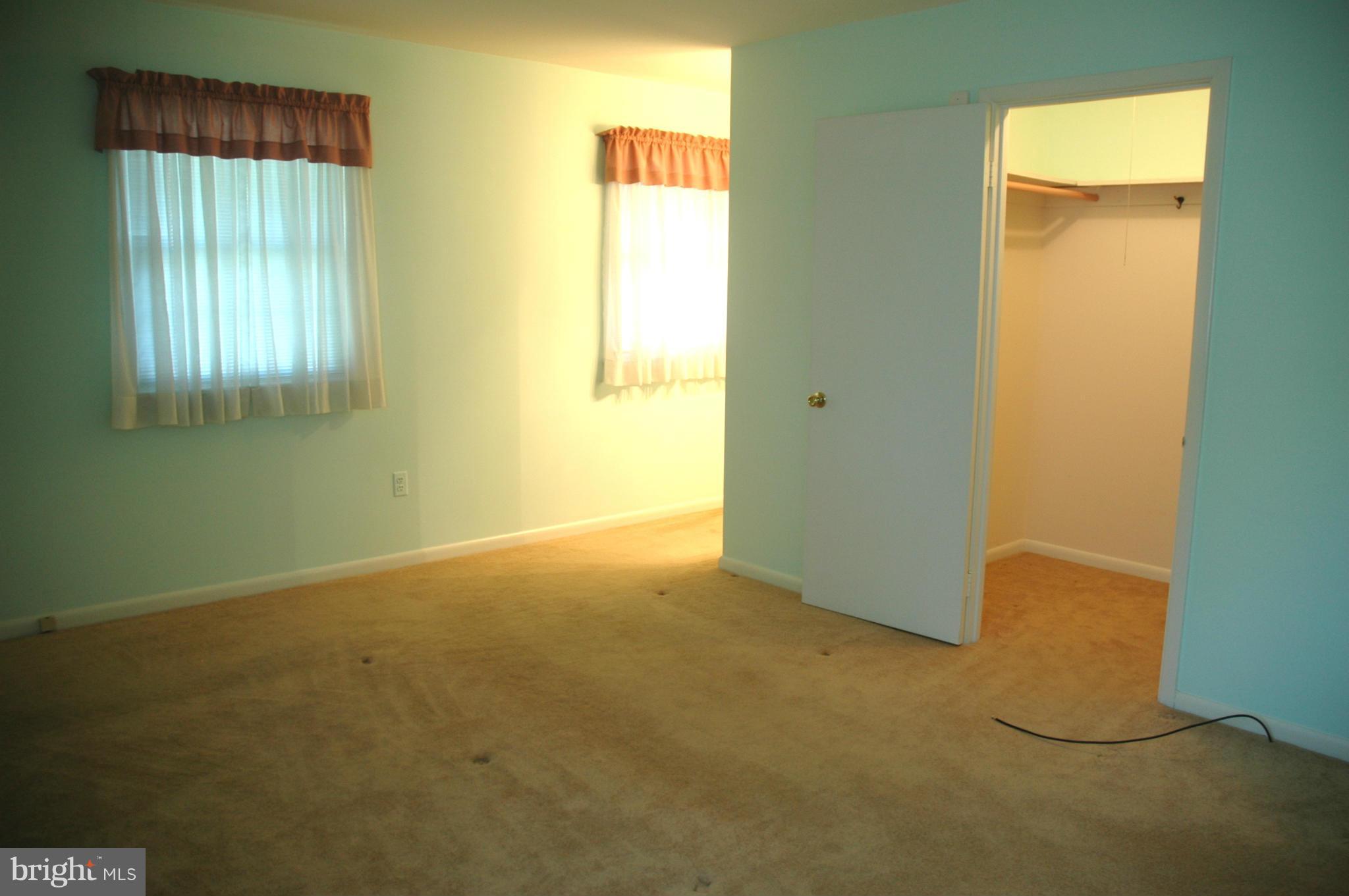 14717 Flintstone Lane Silver Spring, MD 20905 - Photo 14 of 26 a view of an empty room with a window
