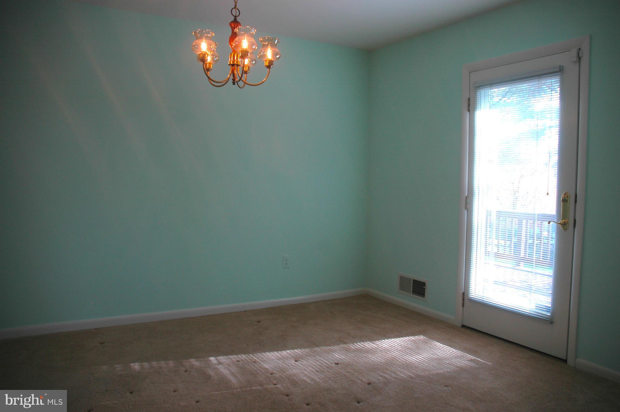 14717 Flintstone Lane Silver Spring, MD 20905 - Photo 16 of 26 an empty room with a window