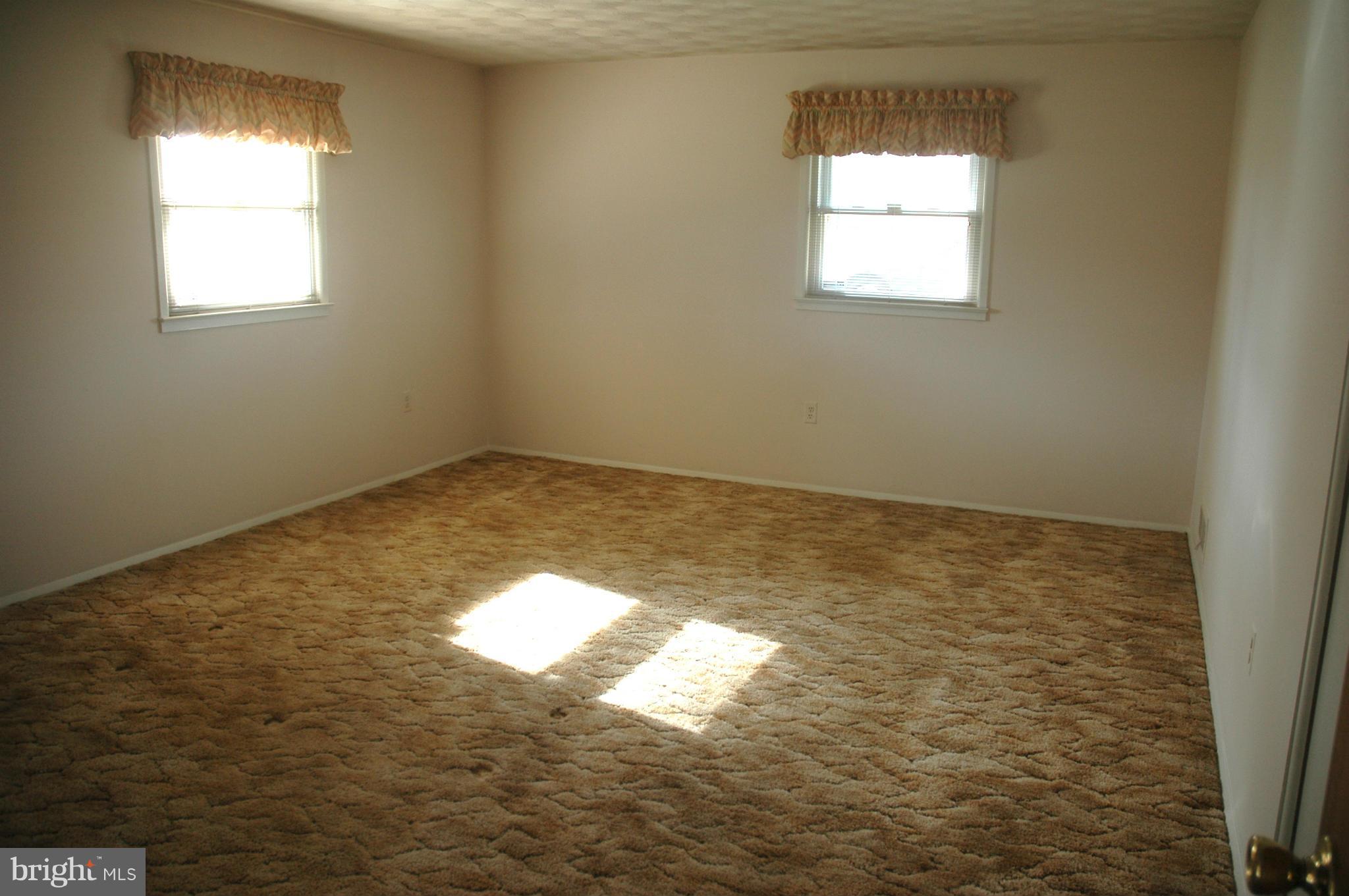 14717 Flintstone Lane Silver Spring, MD 20905 - Photo 20 of 26 a view of an empty room and window