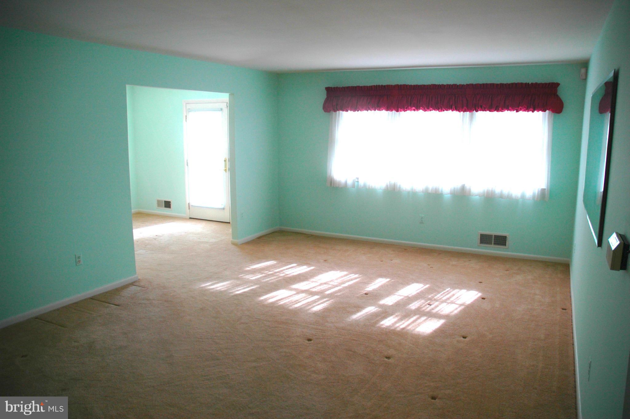14717 Flintstone Lane Silver Spring, MD 20905 - Photo 5 of 26 a view of a room with a window