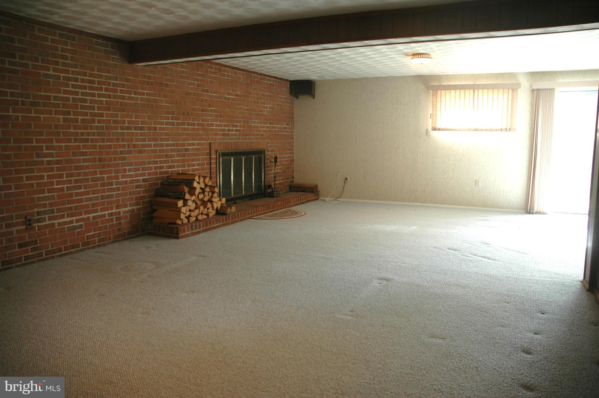 14717 Flintstone Lane Silver Spring, MD 20905 - Photo 6 of 26 a view of a garage with a window