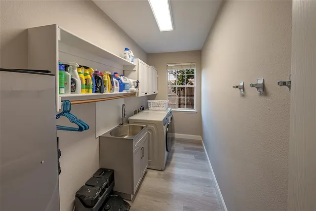 a storage room with washer and dryer