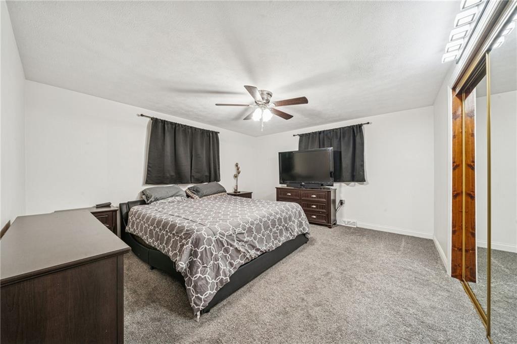 190 Urban Road Saltsburg, PA 15681 - Photo 13 of 44 a bedroom with a bed and a flat screen tv