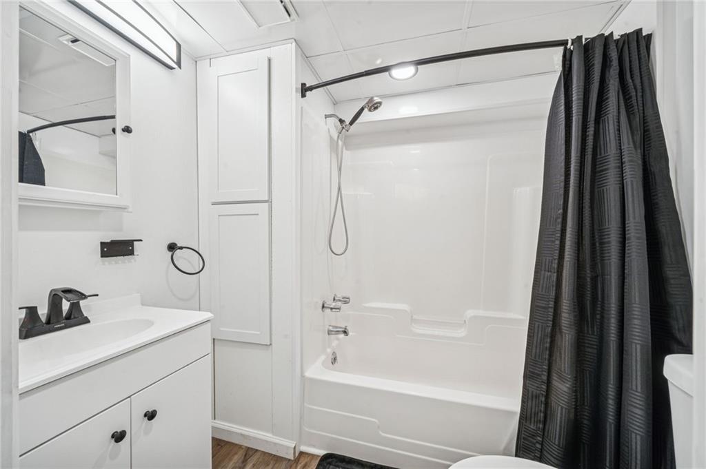 190 Urban Road Saltsburg, PA 15681 - Photo 20 of 44 a bathroom with a shower curtain a sink and a shower curtain