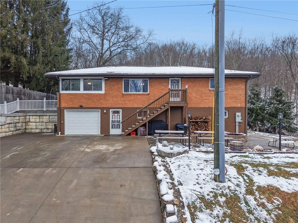 190 Urban Road Saltsburg, PA 15681 - Photo 2 of 44 a view of a house with a snow on the road