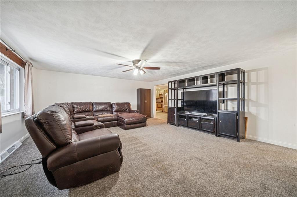 190 Urban Road Saltsburg, PA 15681 - Photo 3 of 44 a living room with furniture and a flat screen tv
