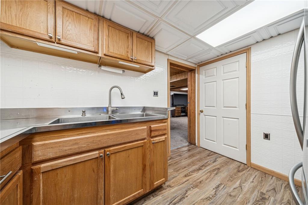190 Urban Road Saltsburg, PA 15681 - Photo 31 of 44 a kitchen with stainless steel appliances granite countertop a sink and cabinets