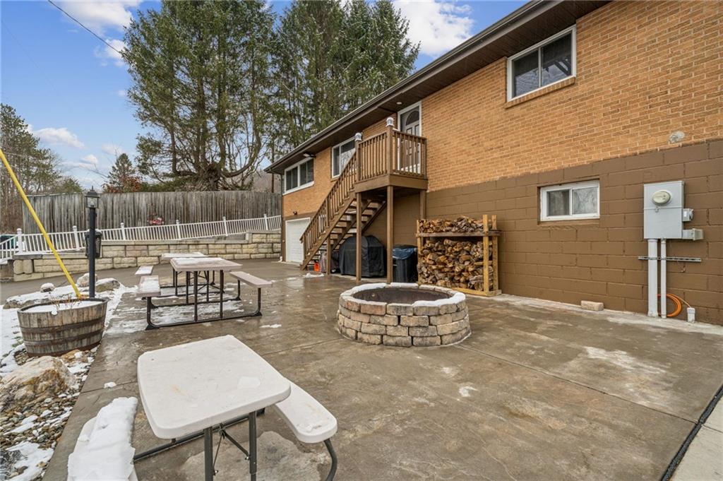 190 Urban Road Saltsburg, PA 15681 - Photo 38 of 44 a backyard of a house with a fountain table and chairs