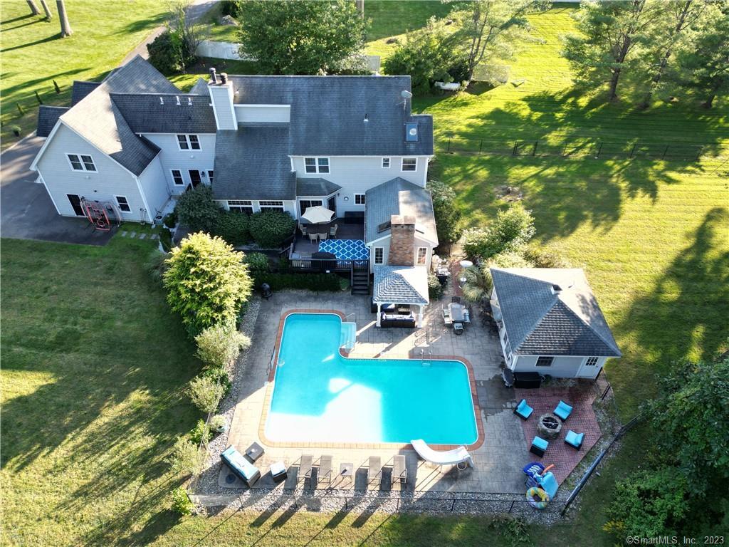 14 Country Club Road Seymour, CT 06483 - Photo 1 of 1 an aerial view of a house with a garden and swimming pool