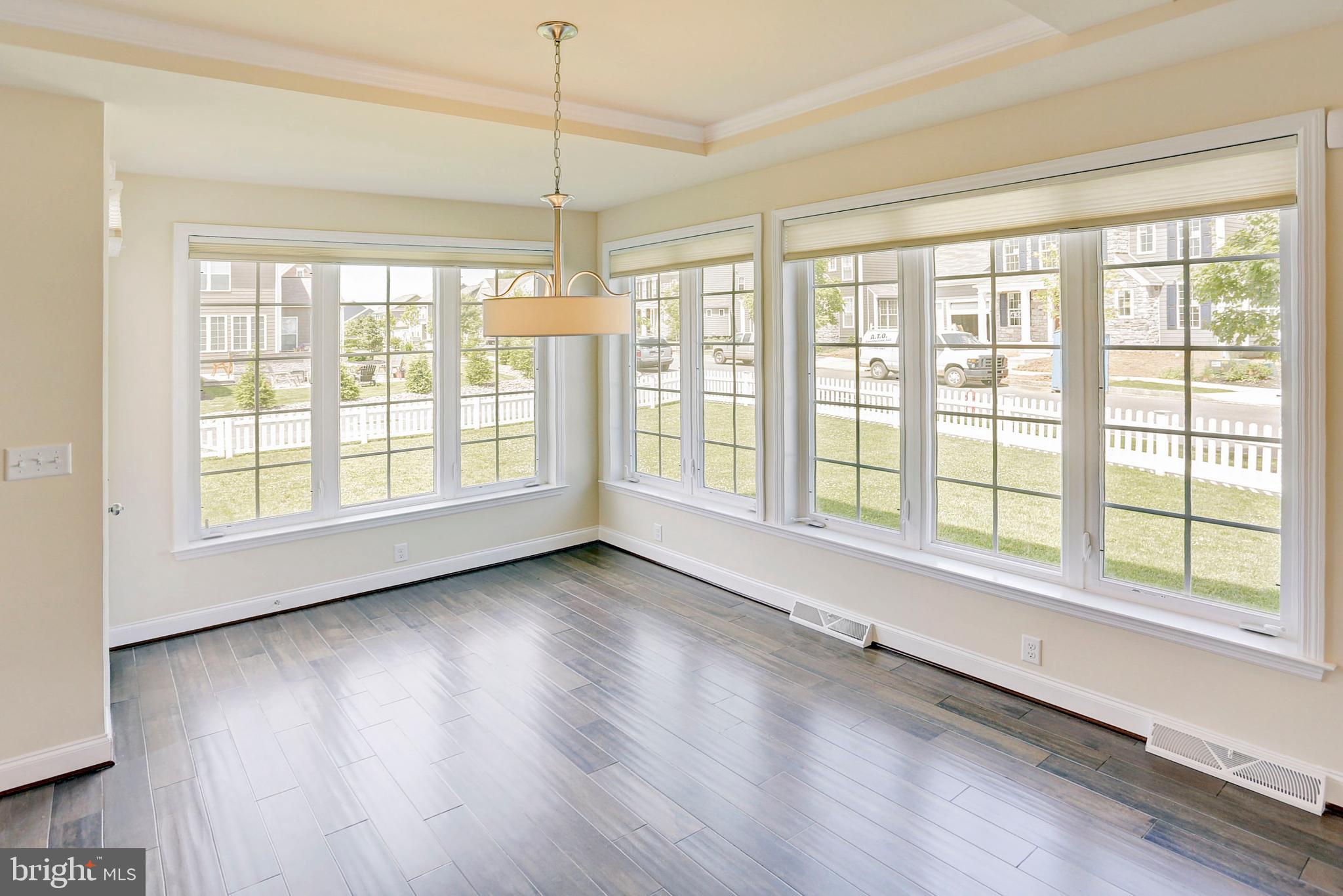 530 Madison Road Mechanicsburg, PA 17050 - Photo 11 of 37 Luminous eat-in area w/ wall of windows