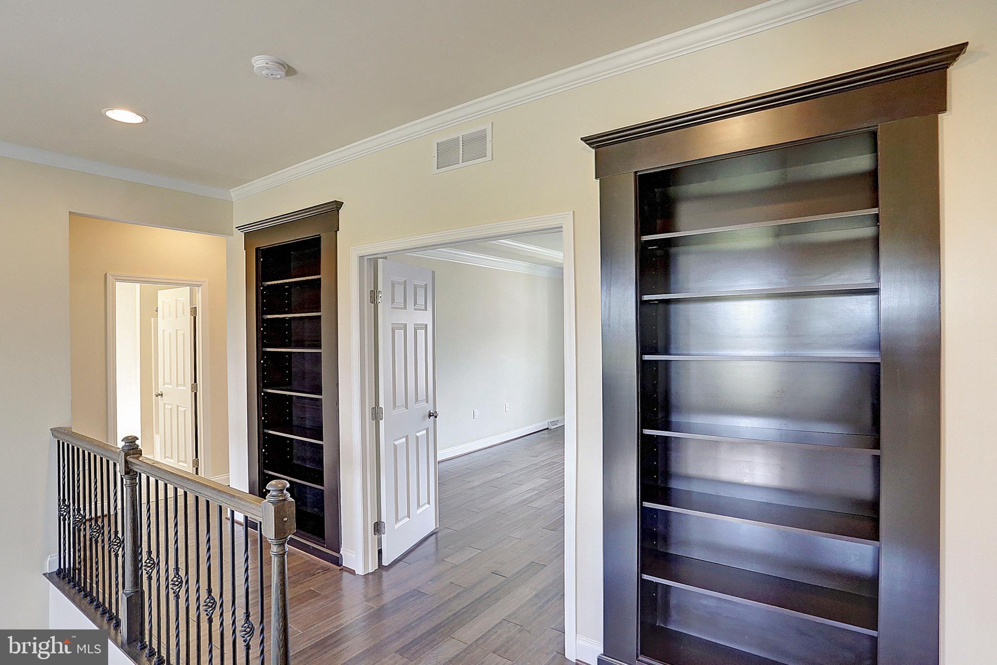 530 Madison Road Mechanicsburg, PA 17050 - Photo 15 of 37 Grand second floor landing w/ built in bookcases