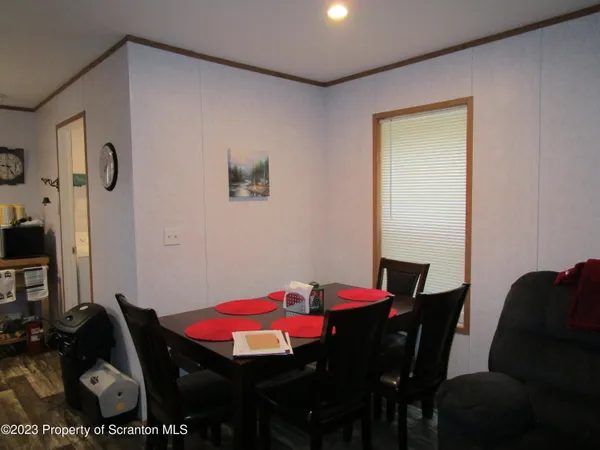 a view of a dining room with furniture