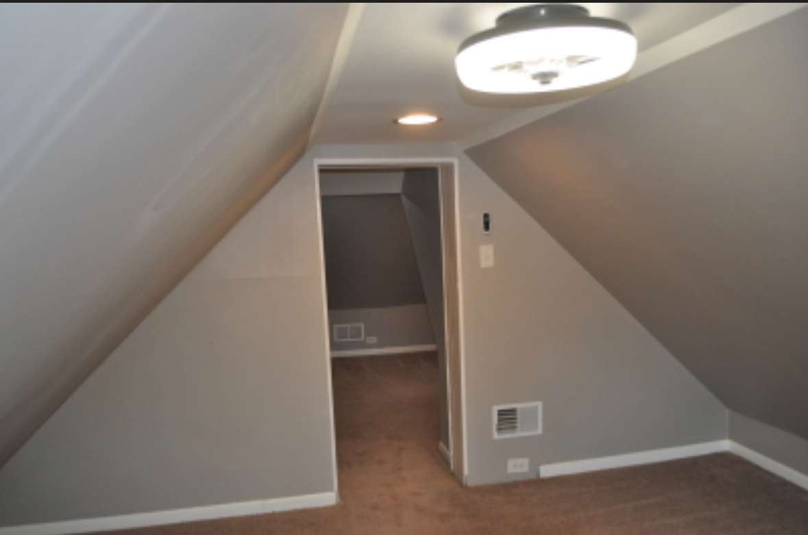 5017 West 29th Street Cicero, IL 60804 - Photo 7 of 17 a view of an empty room with a window