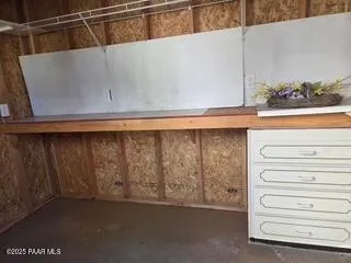 a street view with large trees