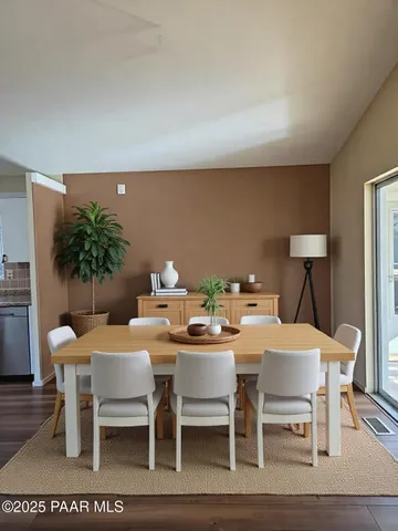 a kitchen with stainless steel appliances a stove cabinets and microwave