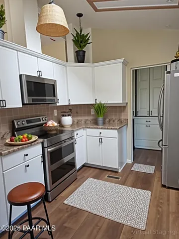 a bed room with a bed and a window