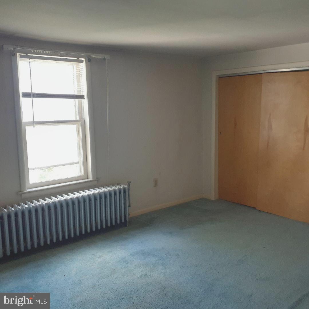 309 Chestnut Street St. Clair, PA 17970 - Photo 19 of 20 an empty room with a window