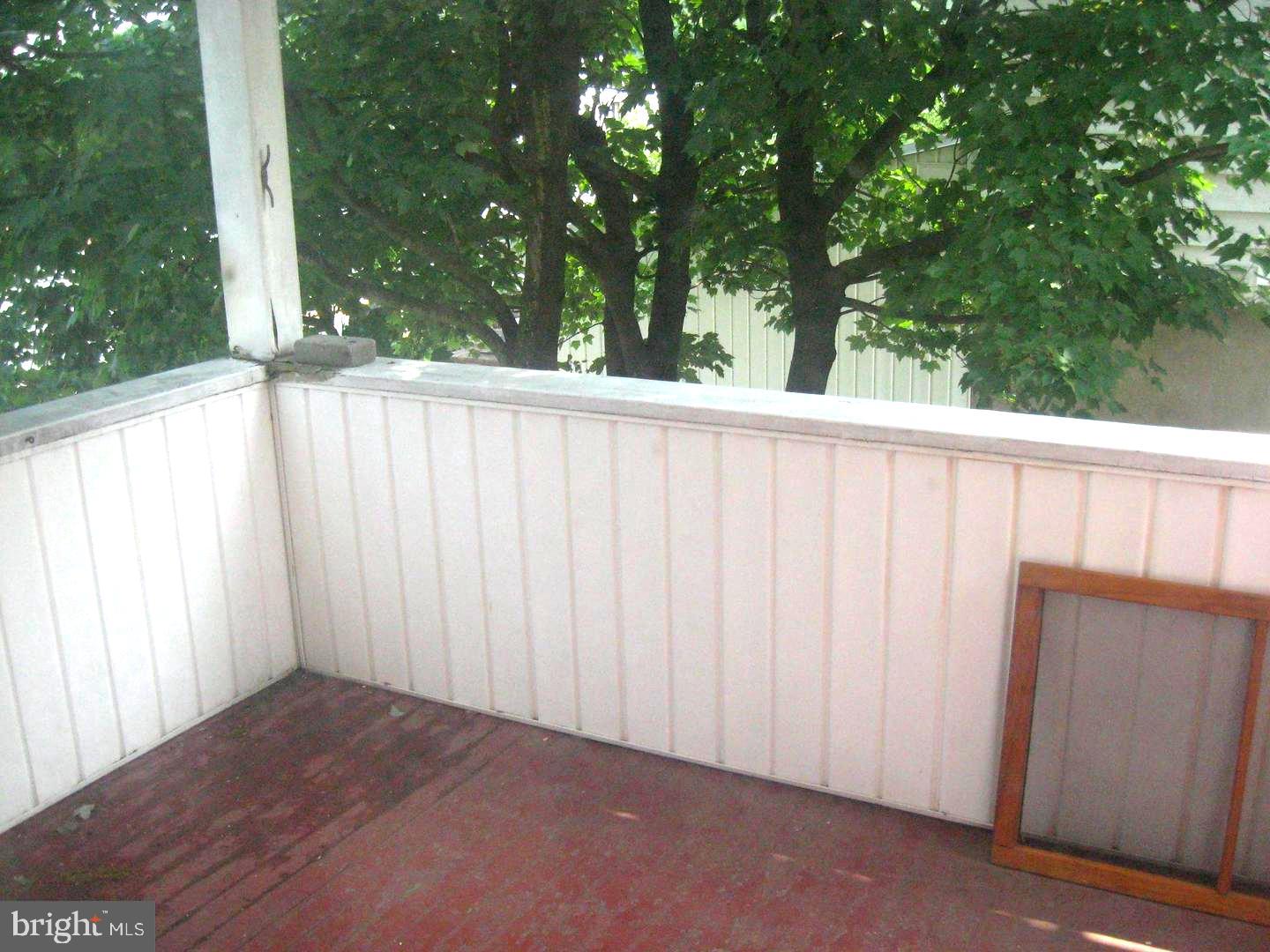309 Chestnut Street St. Clair, PA 17970 - Photo 3 of 20 a view of a balcony with wooden fence