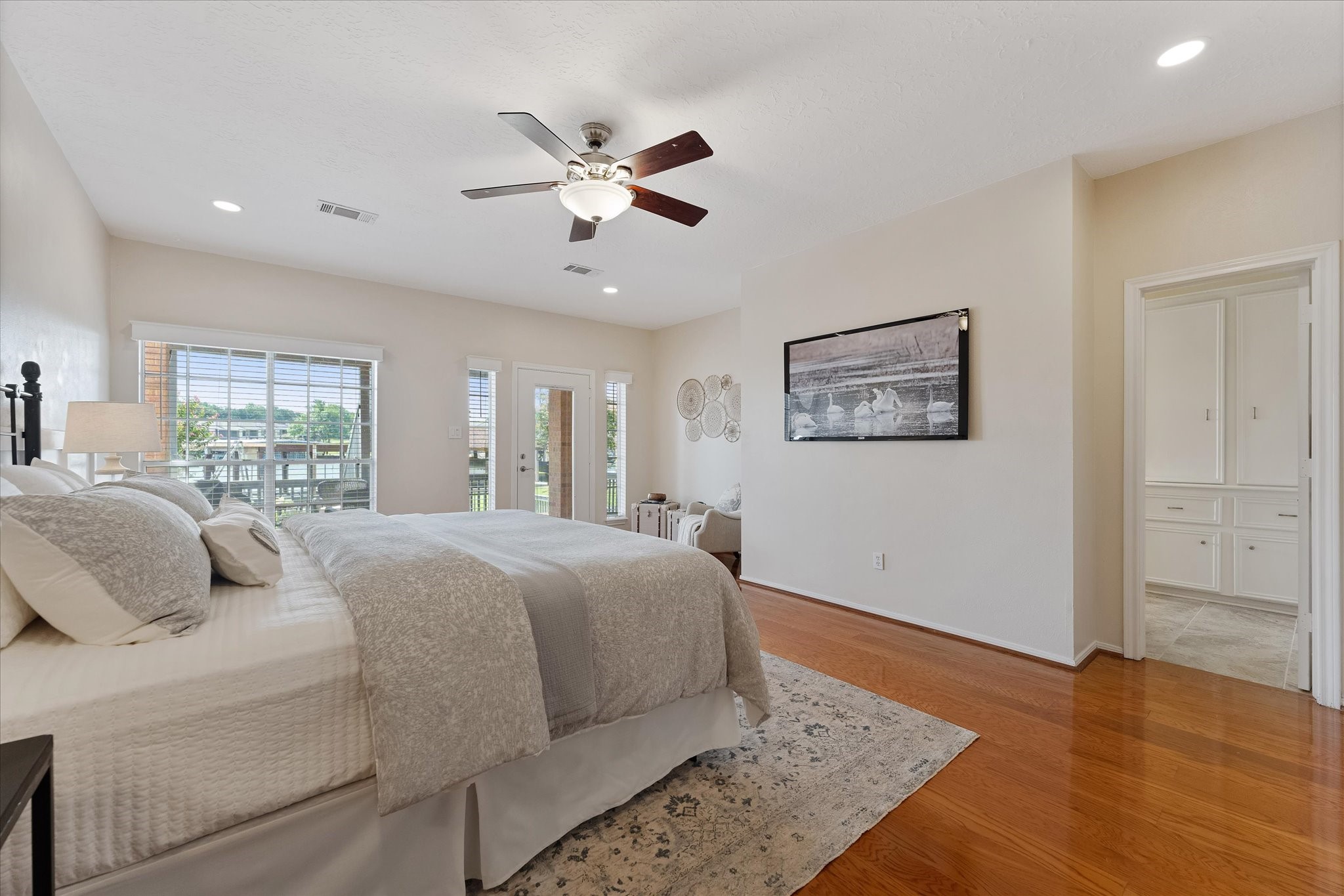 225 Capetown Conroe, TX 77356 - Photo 25 of 38 a bedroom with a large bed and a window