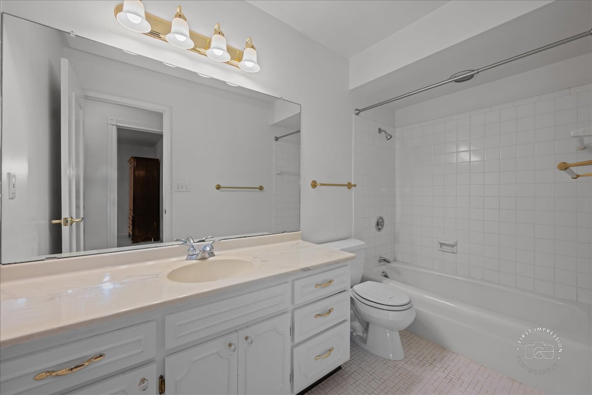 36 Winthrop New Road Sugar Grove, IL 60554 - Photo 23 of 32 a bathroom with a sink a toilet and shower