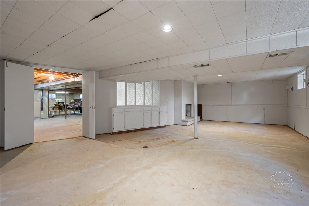 36 Winthrop New Road Sugar Grove, IL 60554 - Photo 26 of 32 a view of an empty room with a fireplace