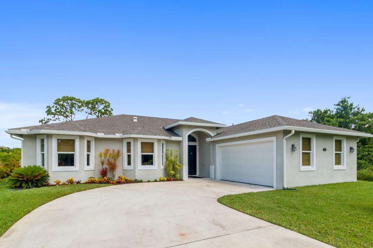 3214 Southwest Constellation Road Port St. Lucie, FL 34953 - Photo 1 of 1 EXQUISITE 2017 HOME!