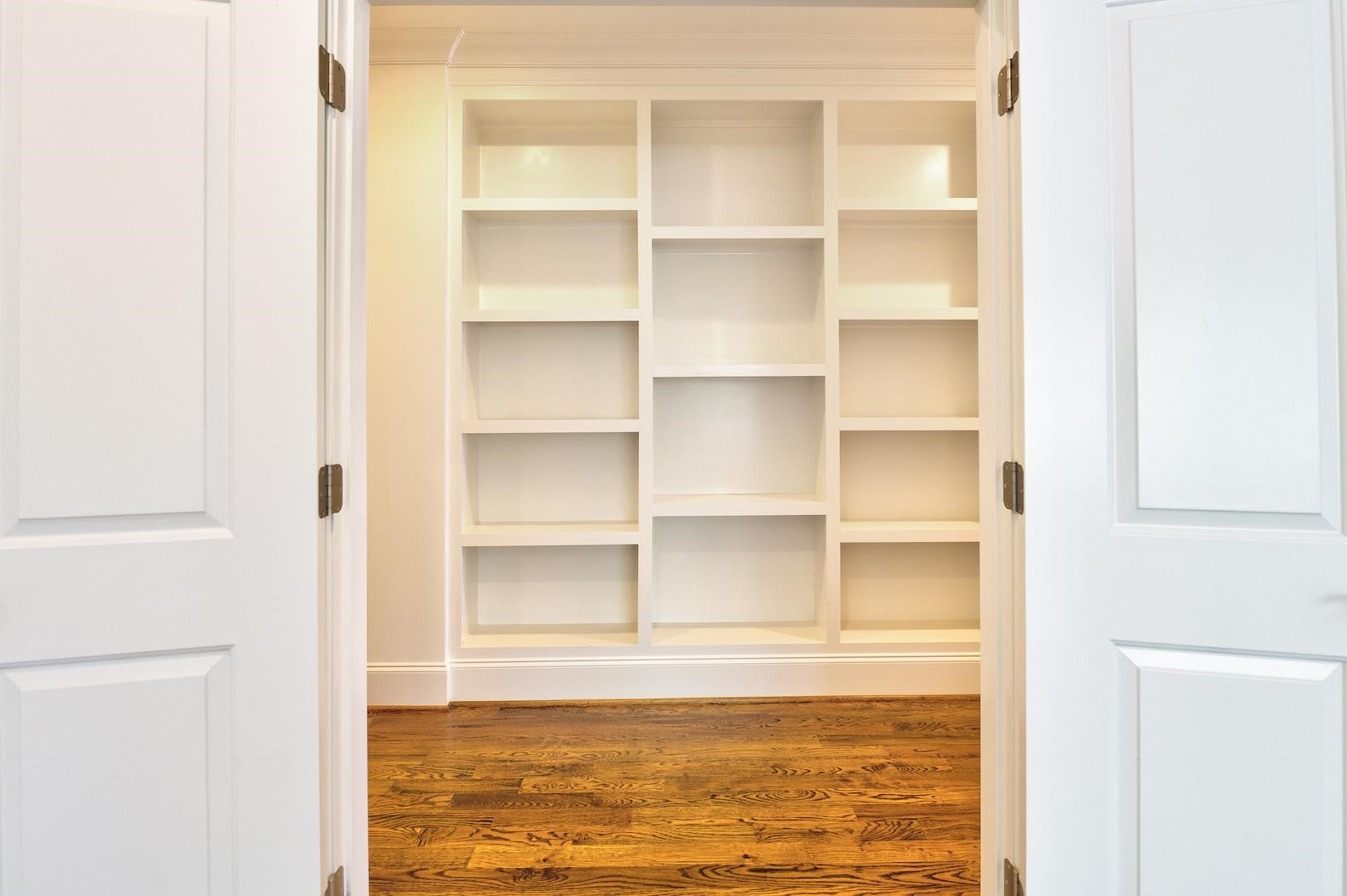 2603 Wells Avenue Raleigh, NC 27608 - Photo 25 of 43 custom decor shelving in upper hallway