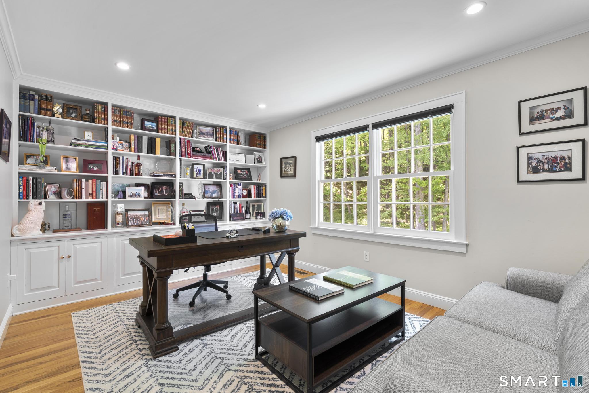 181 Old Branchville Road Ridgefield, CT 06877 - Photo 8 of 40 a reading room with furniture and a book shelf