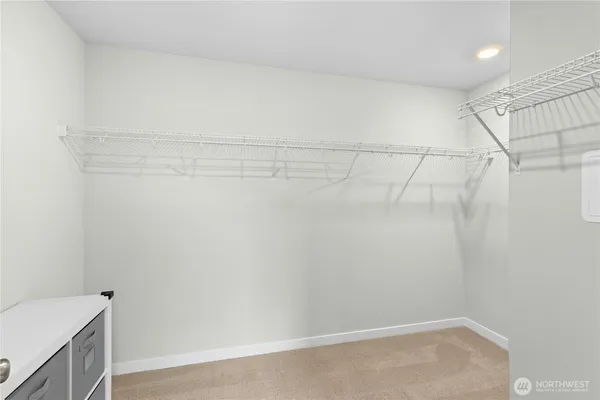 a view of a room with racks on the wall