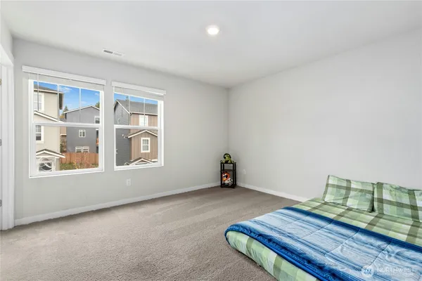 a view of an empty room with glass door