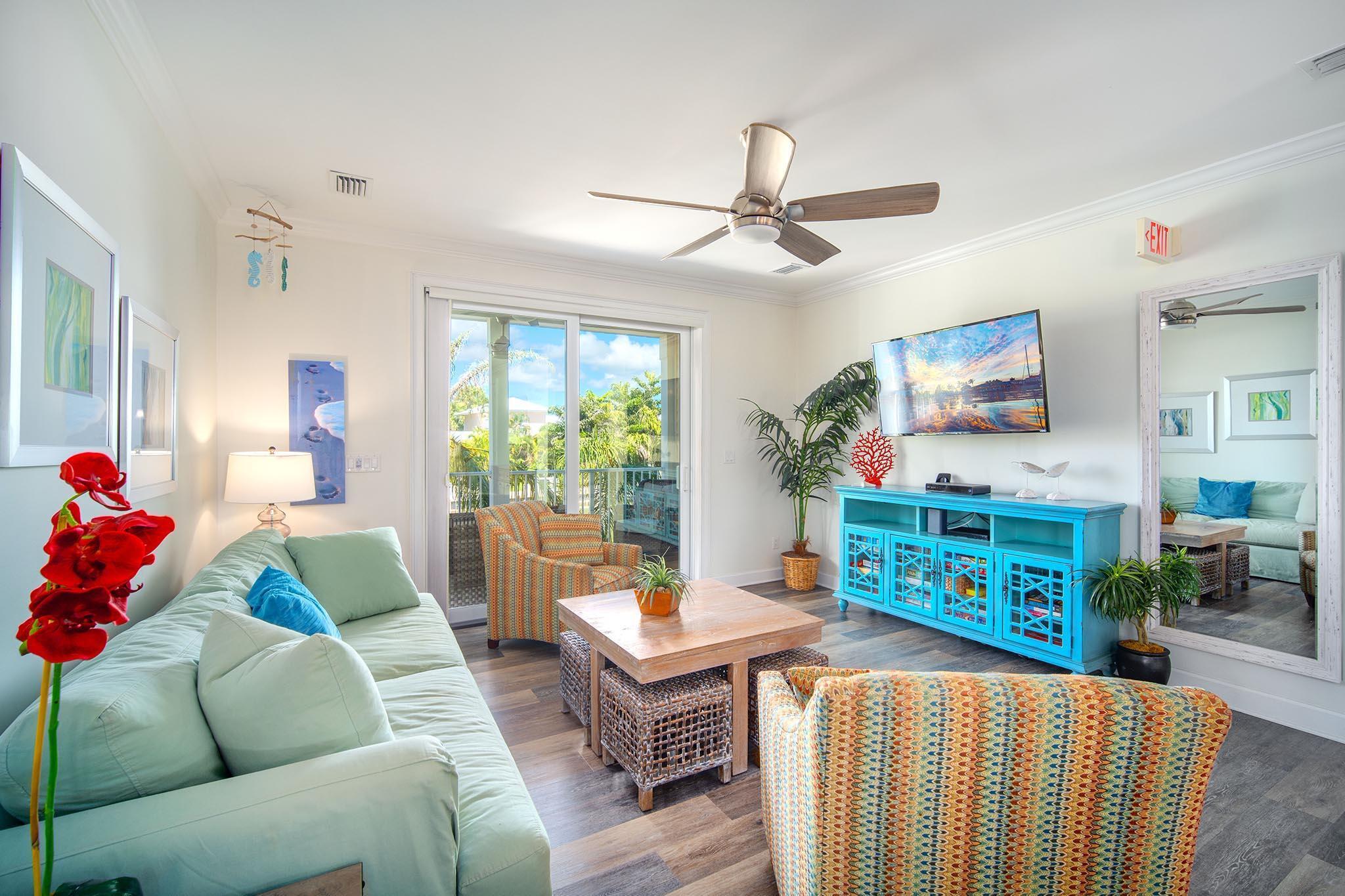 217 Sombrero Beach Road, Unit 1 & 2 Marathon, FL 33050 - Photo 31 of 67 a living room with furniture and a window