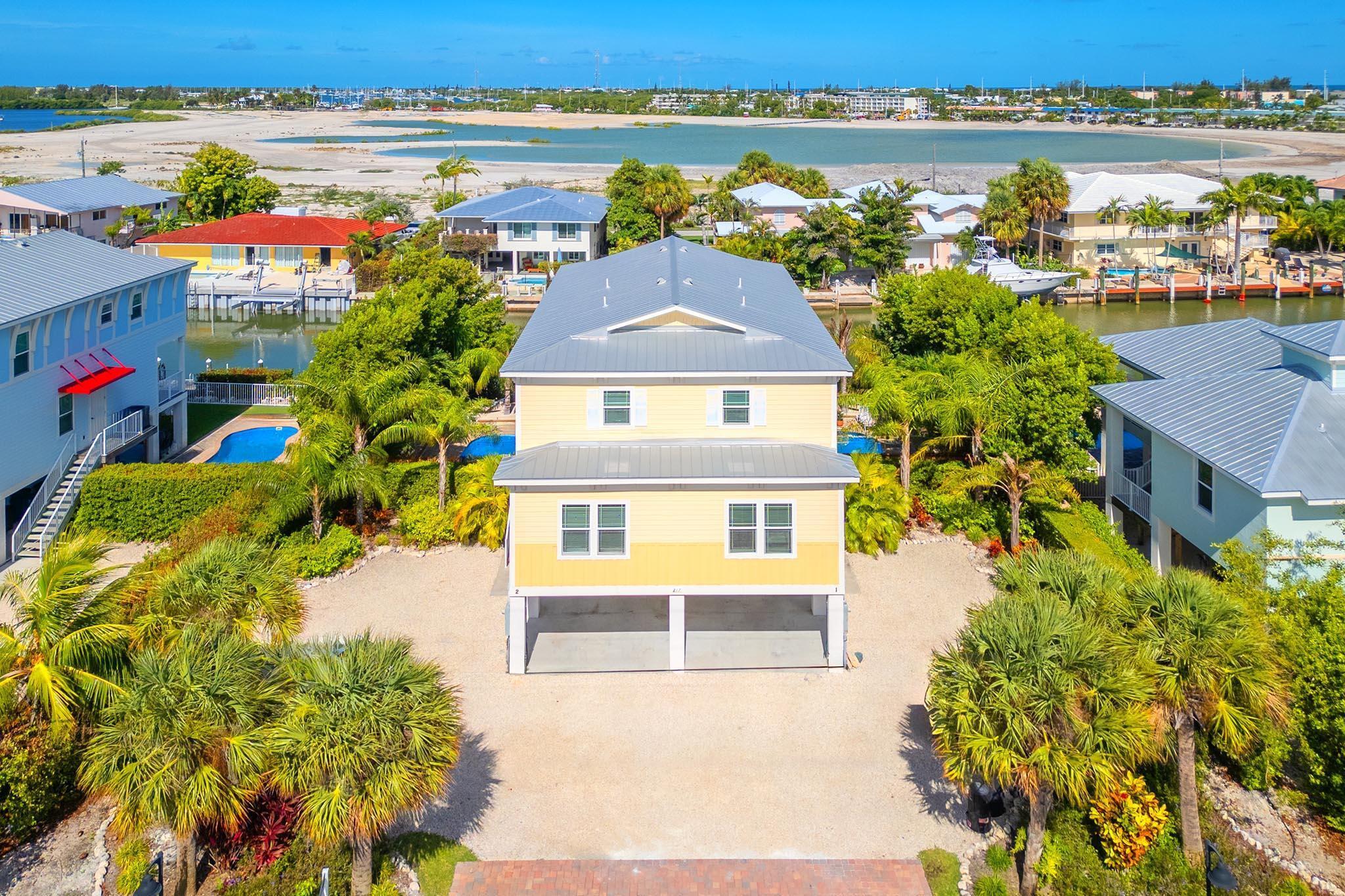 217 Sombrero Beach Road, Unit 1 & 2 Marathon, FL 33050 - Photo 5 of 67 an aerial view of a house with a ocean view