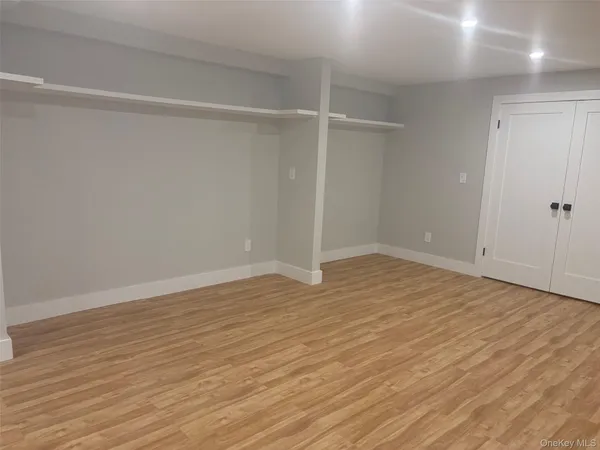 a view of backyard of house with seating space