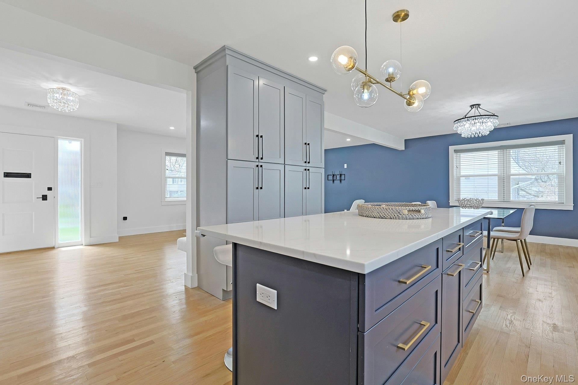 73 Bon Air Avenue New Rochelle, NY 10804 - Photo 8 of 23 a kitchen with a table and chairs