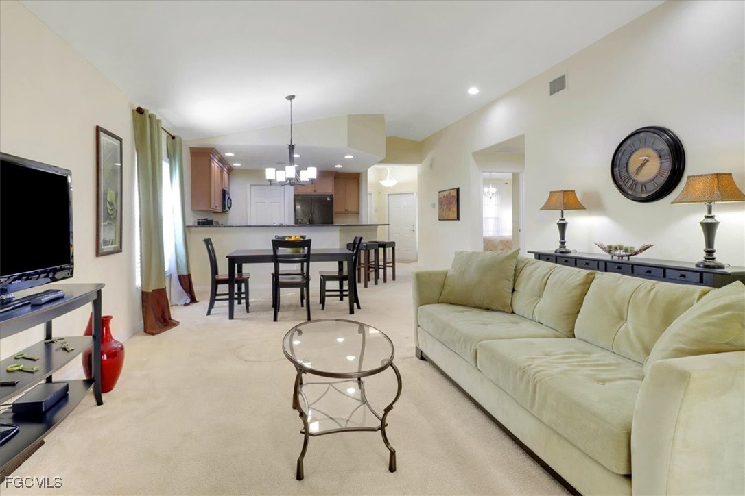 19674 Villa Rosa Loop Estero, FL 33967 - Photo 7 of 33 a living room with furniture and a flat screen tv