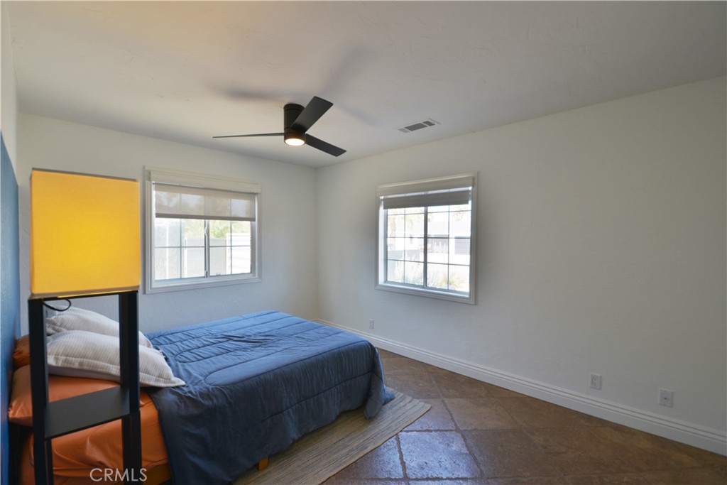 2375 North San Antonio Road Palm Springs, CA 92262 - Photo 14 of 36 a bedroom with a bed and a window