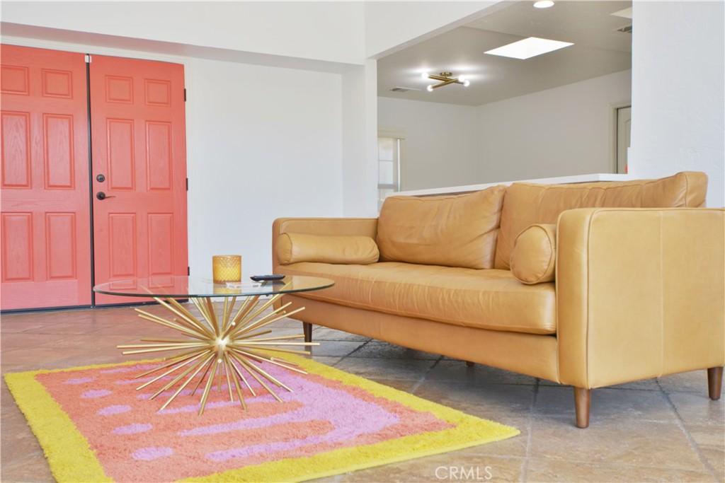 2375 North San Antonio Road Palm Springs, CA 92262 - Photo 17 of 36 a living room with furniture and a rug