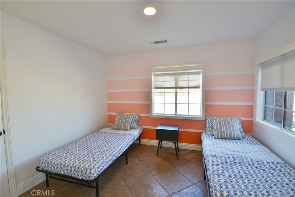2375 North San Antonio Road Palm Springs, CA 92262 - Photo 18 of 36 a living room with a couch and a window