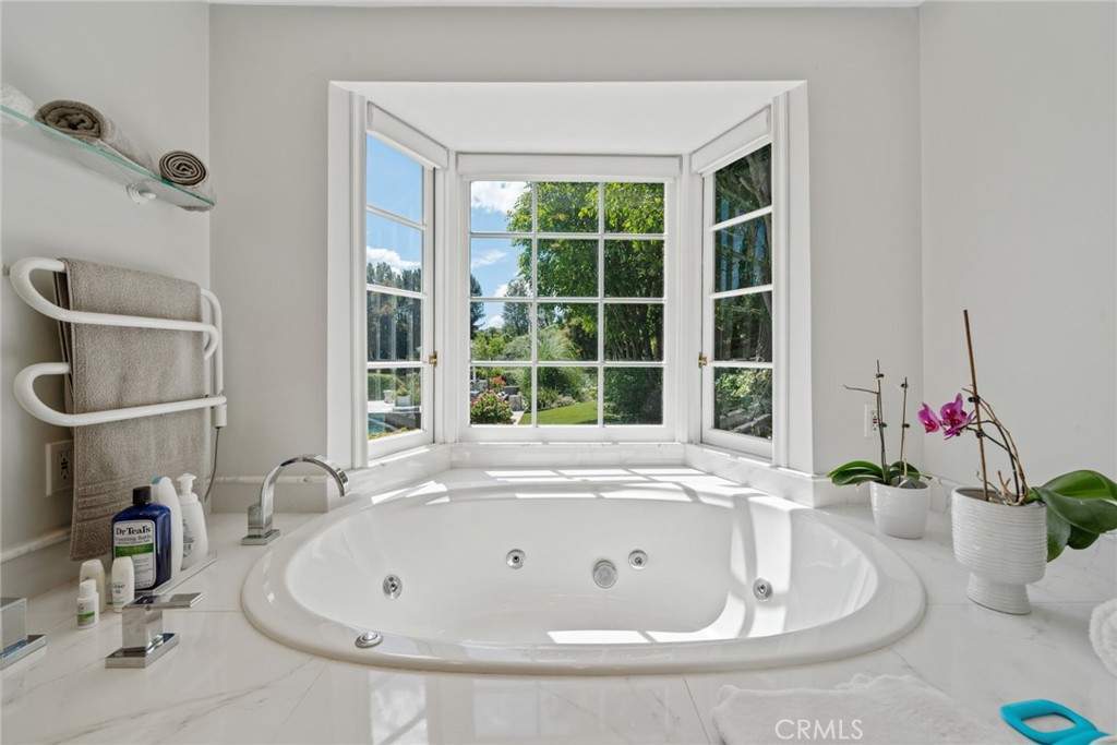 4420 Conchita Way Tarzana, CA 91356 - Photo 13 of 53 a white bath tub sitting next to a window