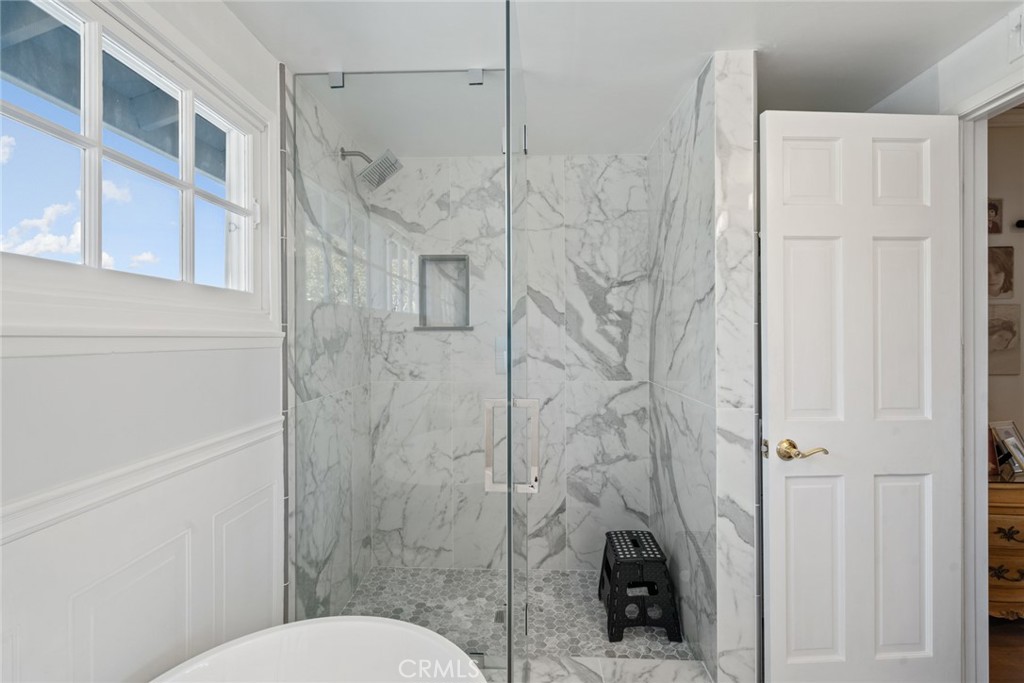 4420 Conchita Way Tarzana, CA 91356 - Photo 18 of 53 a bathroom with a shower and toilet