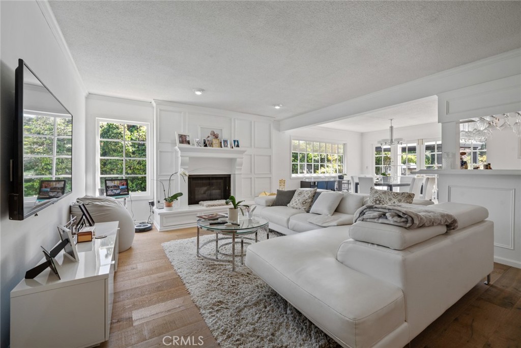 4420 Conchita Way Tarzana, CA 91356 - Photo 20 of 53 a living room with furniture and a fireplace