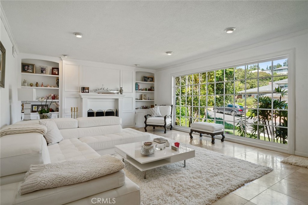 4420 Conchita Way Tarzana, CA 91356 - Photo 5 of 53 a living room with furniture and a large window