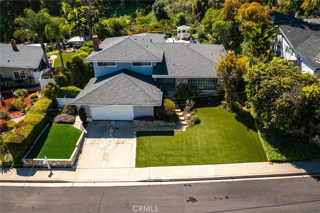 4420 Conchita Way Tarzana, CA 91356 - Photo 52 of 53 an aerial view of a house with swimming pool garden and patio