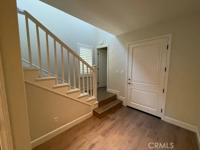 a view of a hallway with staircase